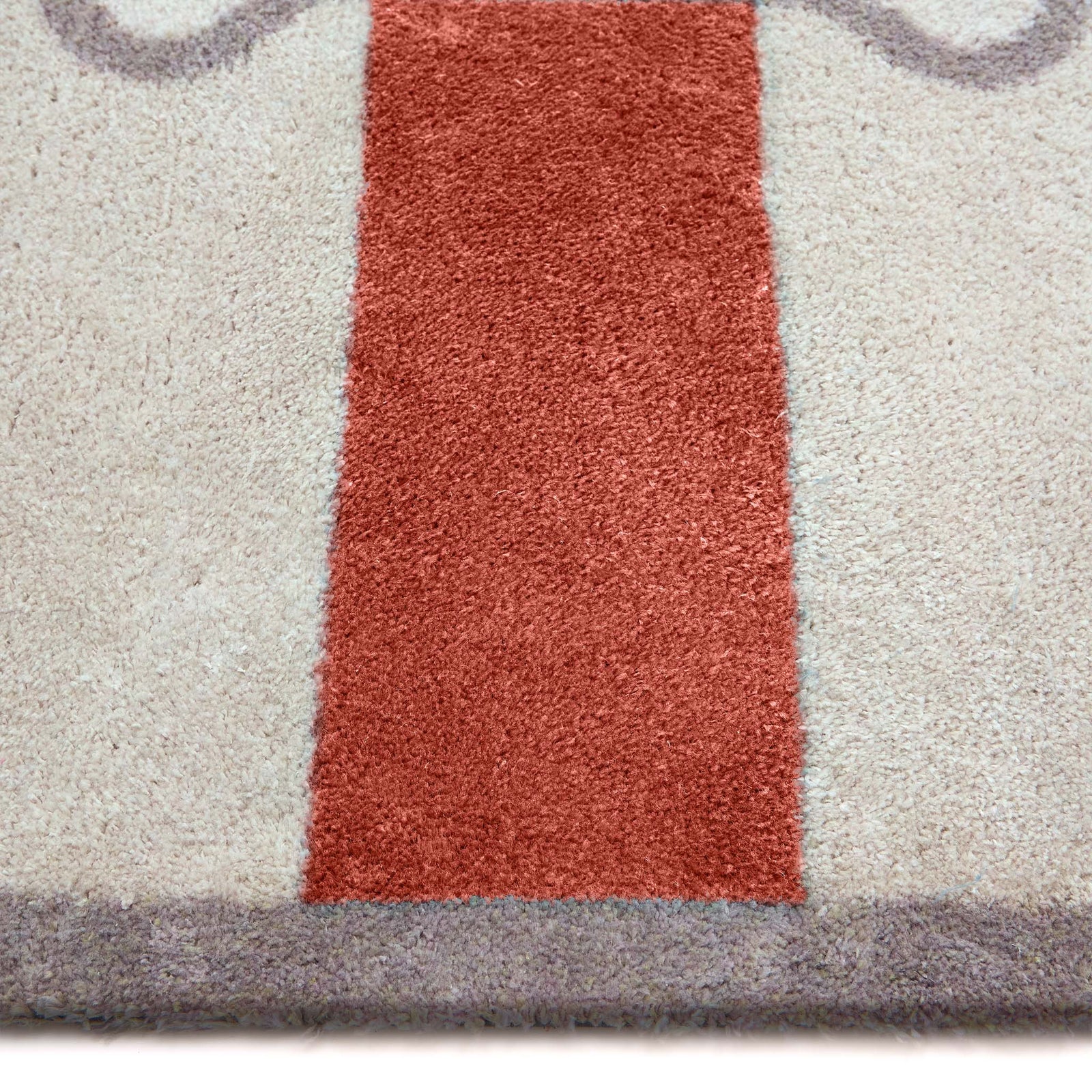 Bone Stripe Rust- 100% recycled cotton doormat featuring a striped pattern with a bone in the centre.