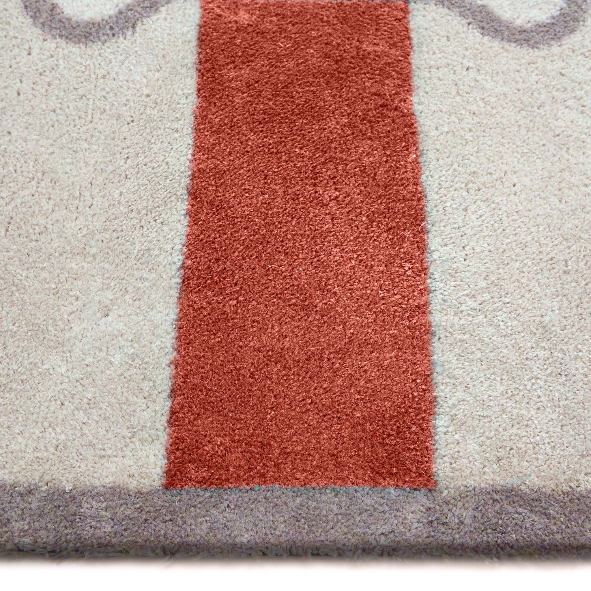 Bone Stripe Rust- 100% recycled cotton doormat featuring a striped pattern with a bone in the centre.