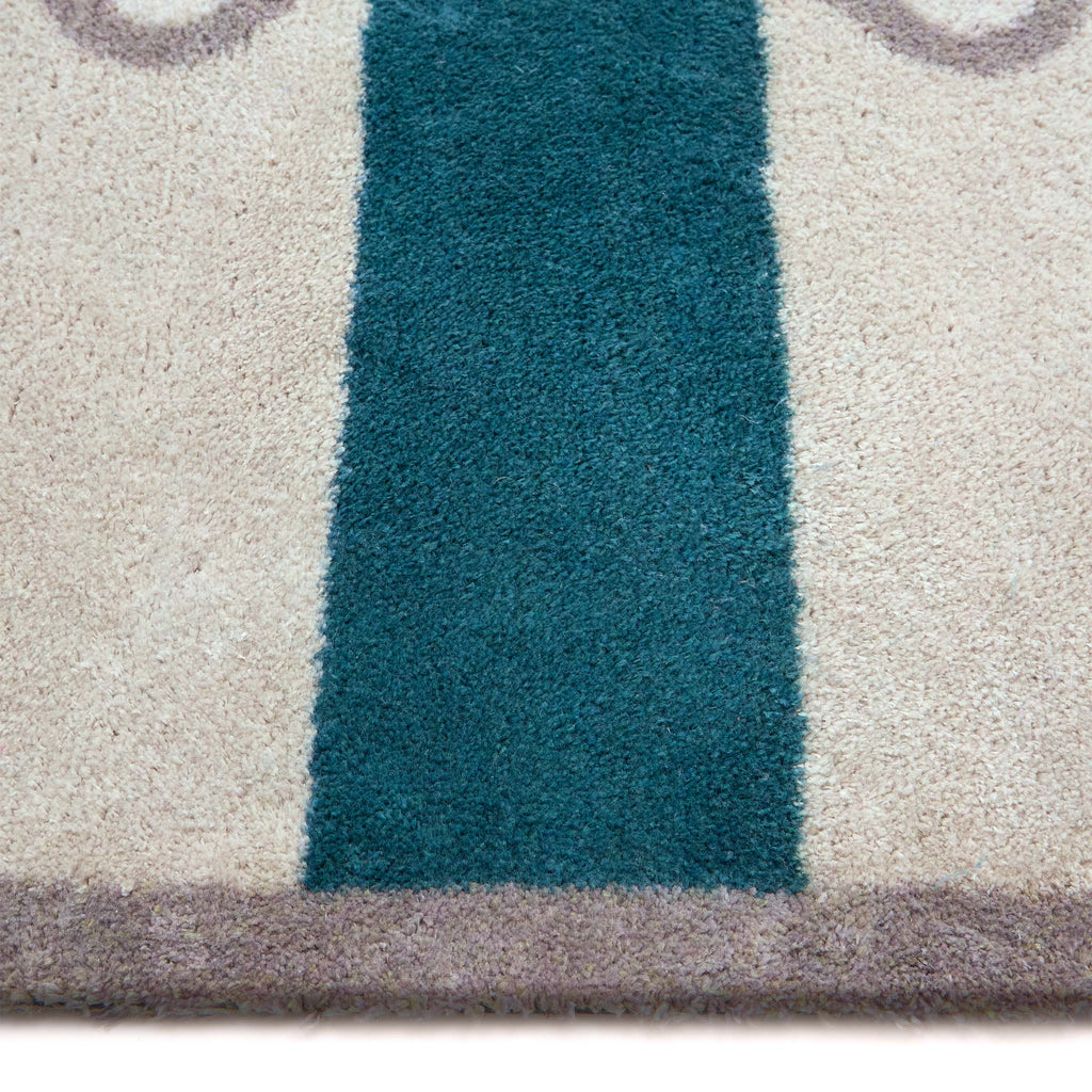 Bone Stripe Teal Doormat- 100% recycled cotton doormat featuring a striped pattern with a bone in the centre.