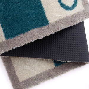 Bone Stripe Teal Doormat- 100% recycled cotton doormat featuring a striped pattern with a bone in the centre.