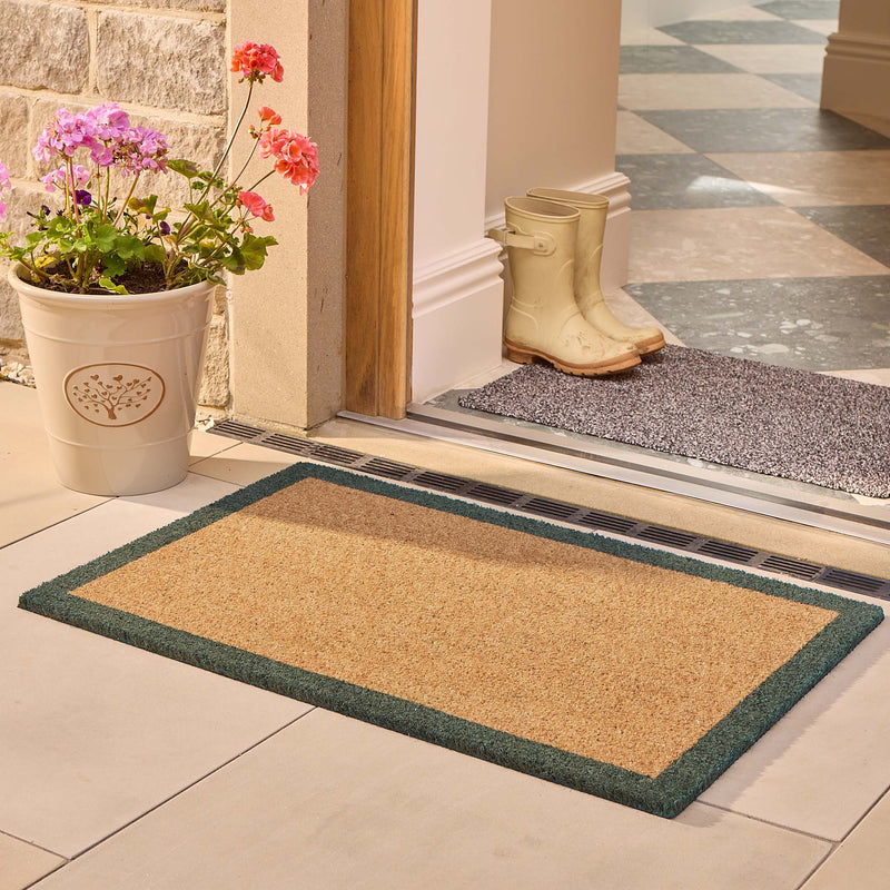 Printed Coir Border Green Doormat- made from recycled materials featuring a green border.