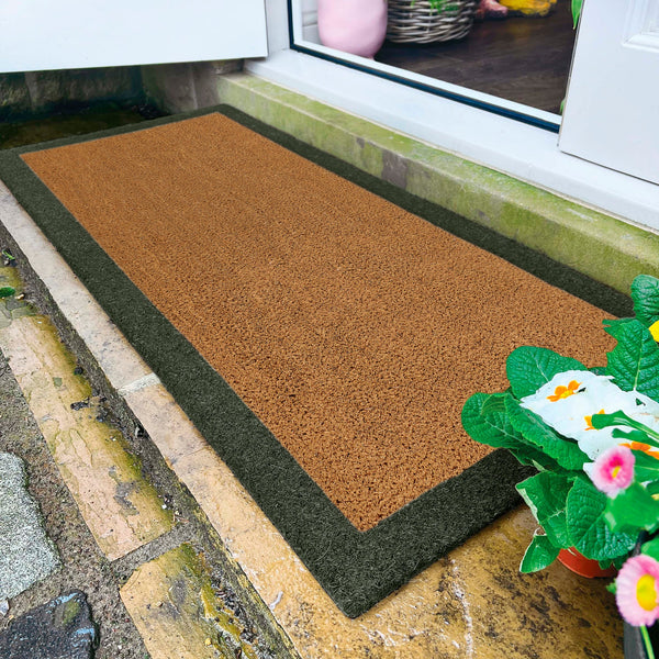 Printed Coir Border Green Doormat made from natural coconut husk fibres, featuring a green border.