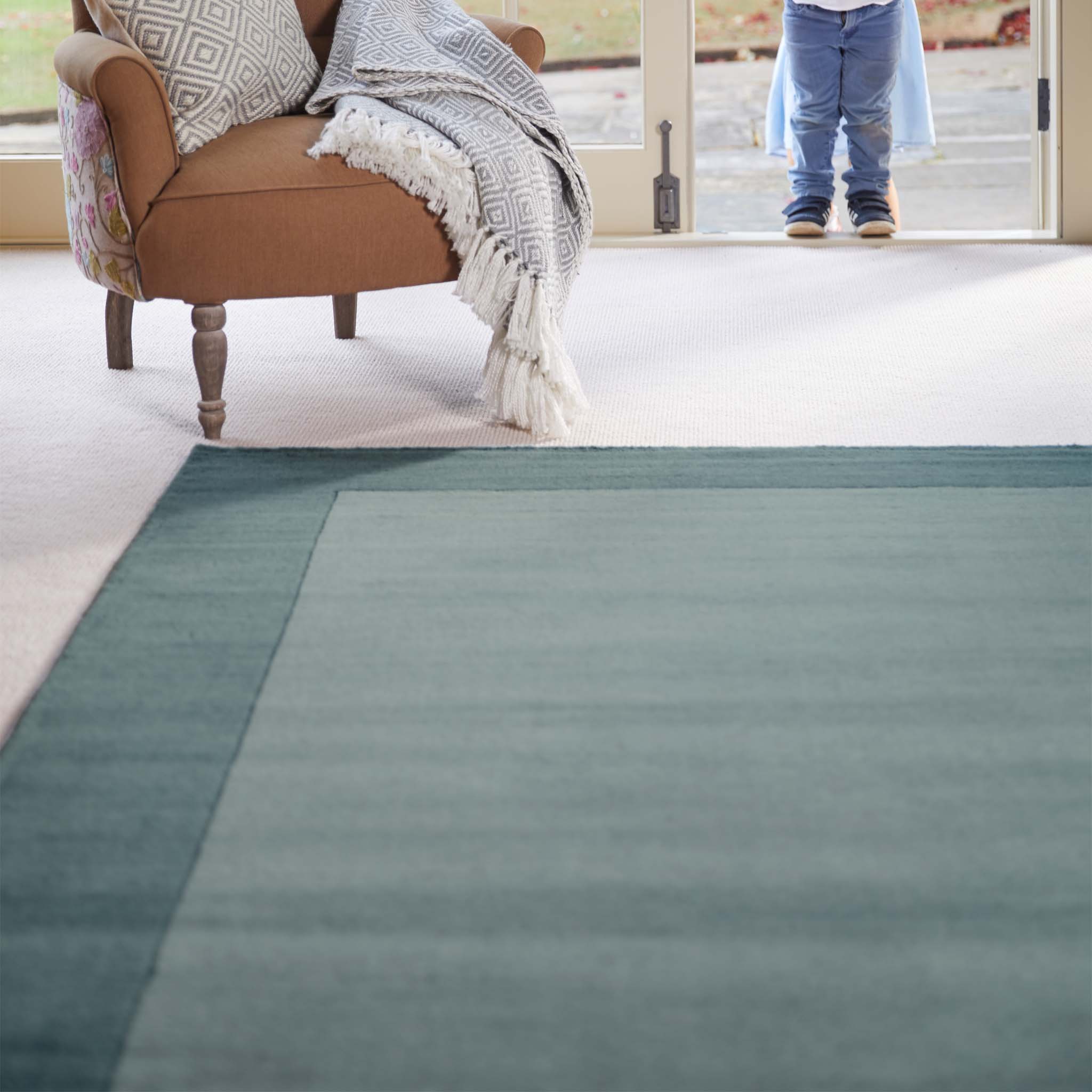 Borders Duck Egg Blue 100% wool rug with a two-tone border design.