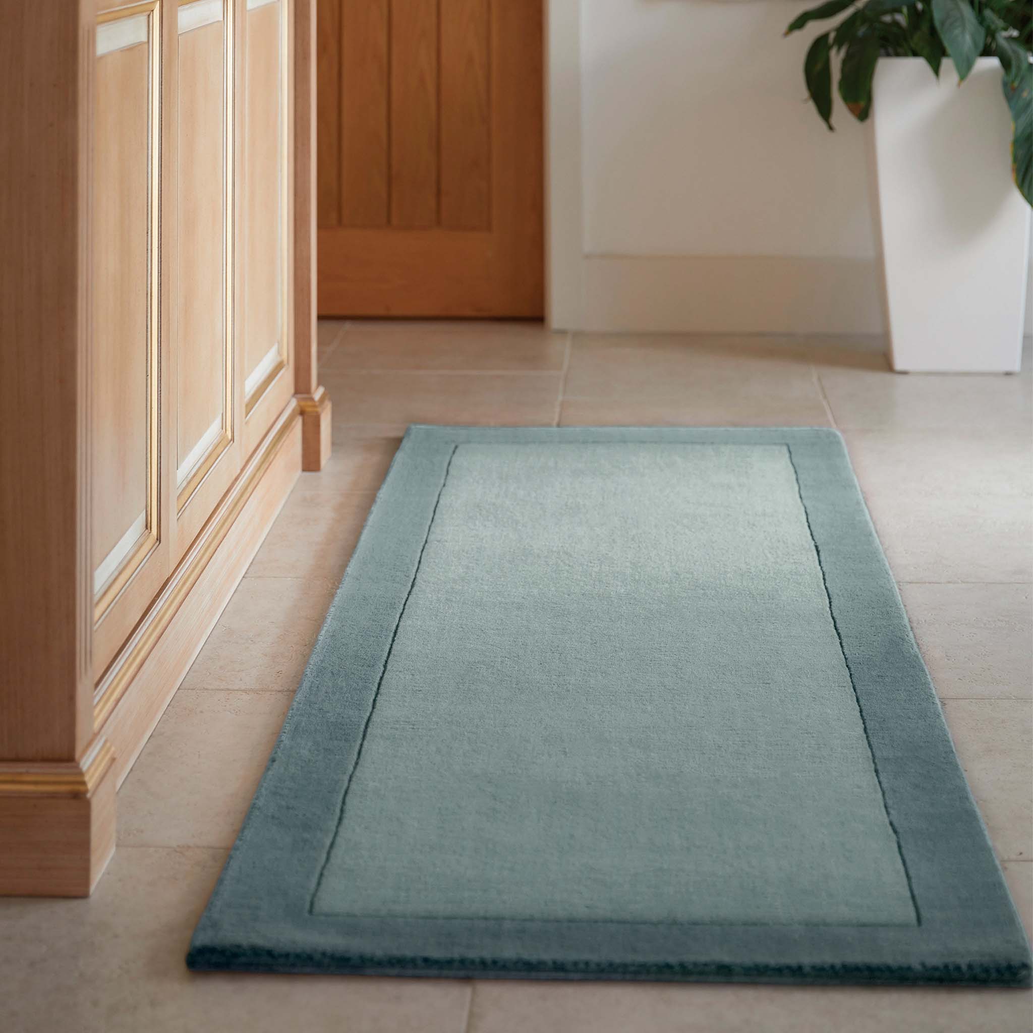 Borders Duck Egg Blue 100% wool runner with a two-tone border design.