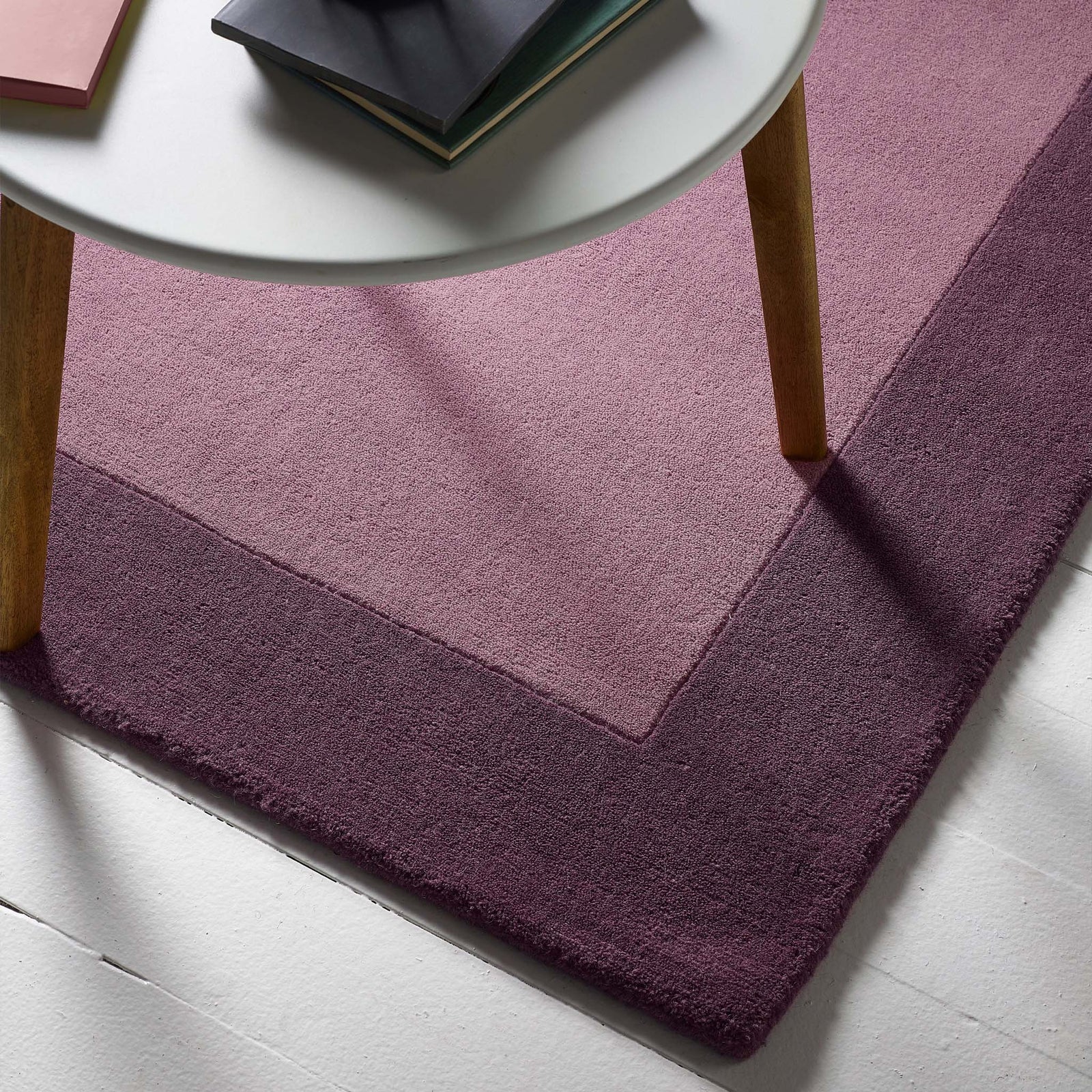 Borders Mauve Pink Purple 100% wool rug with a two-tone border design.