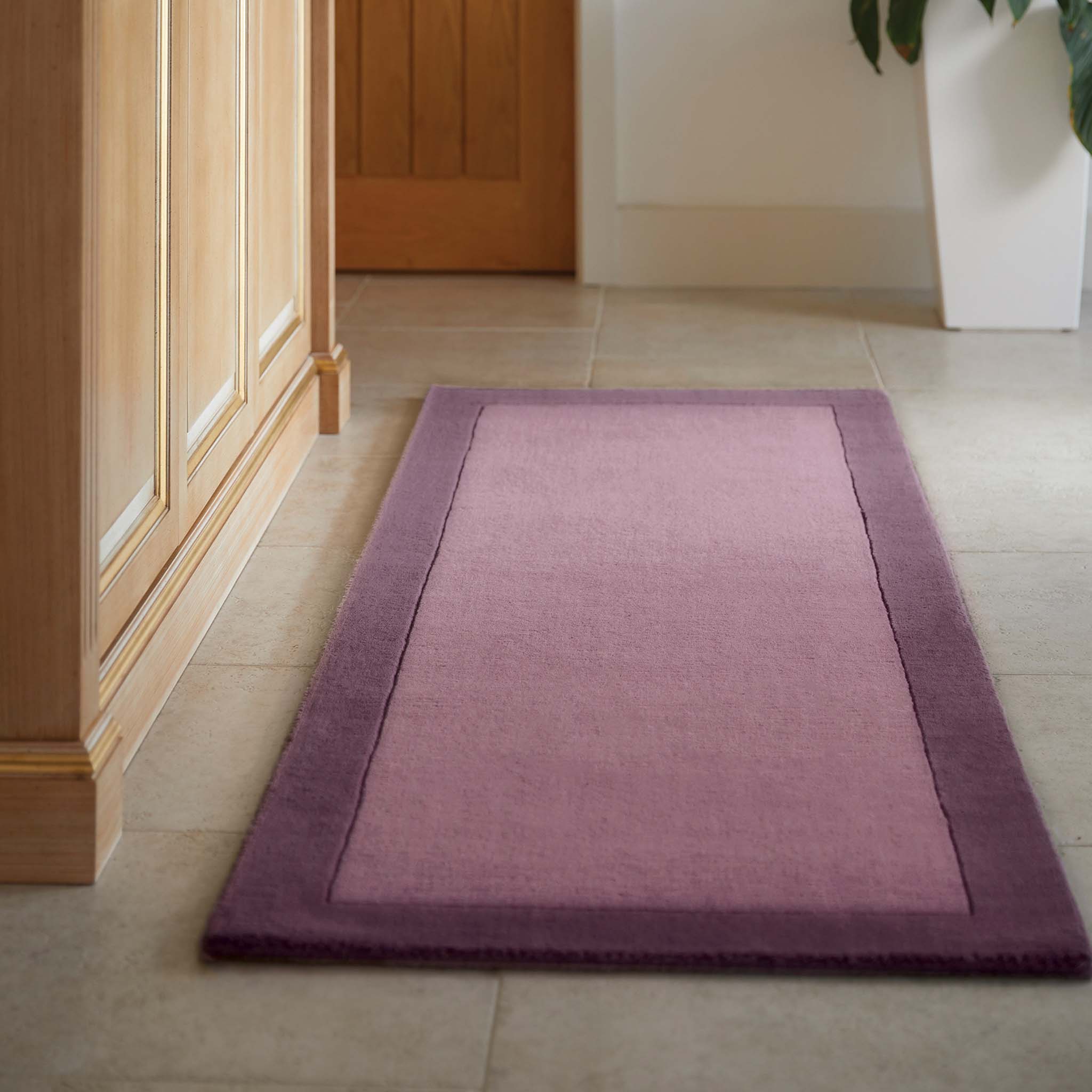 Borders Mauve Purple Pink 100% wool runner with a two-tone border design.