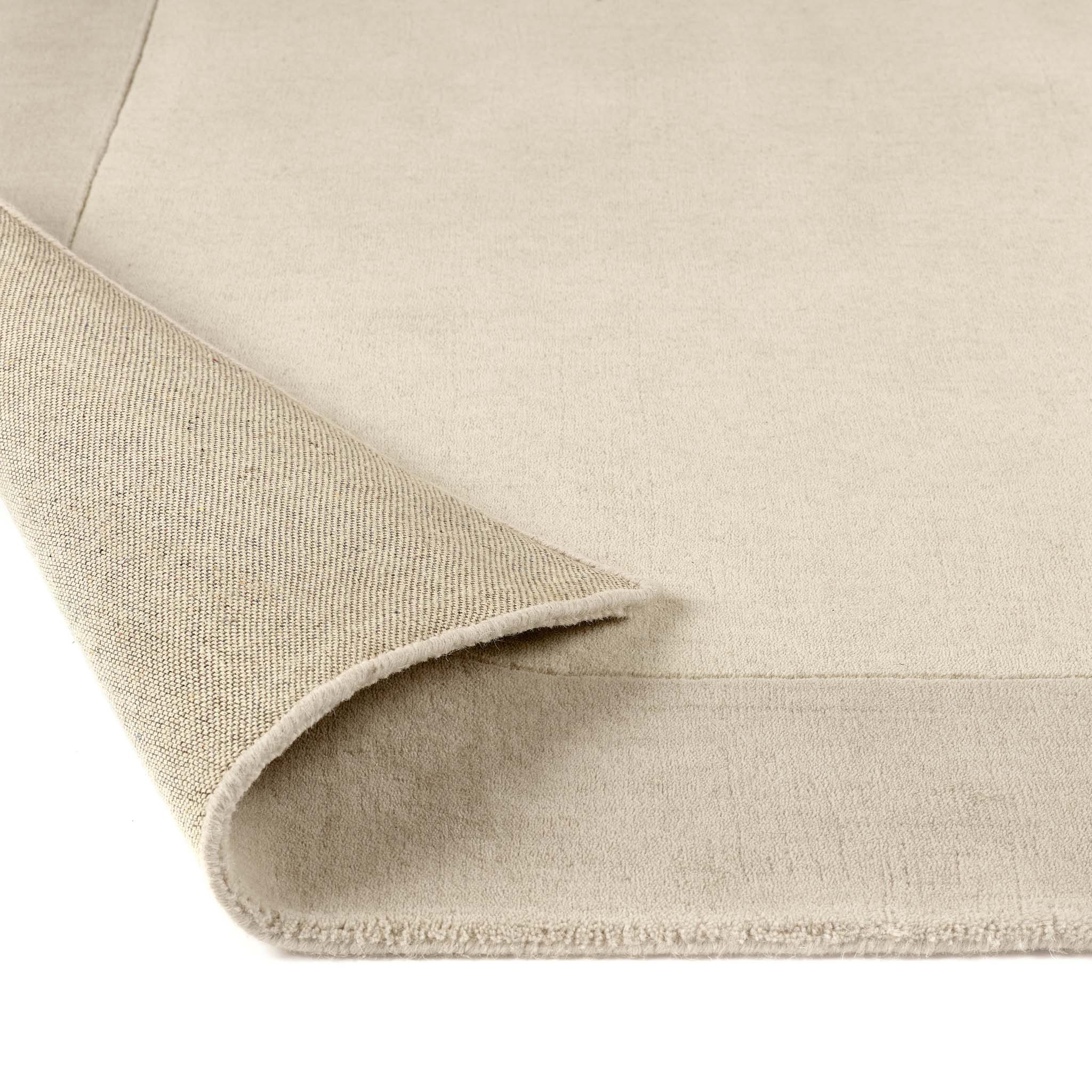 Border Nautral Runner - a 100% wool runner featuring a darker natural border. 