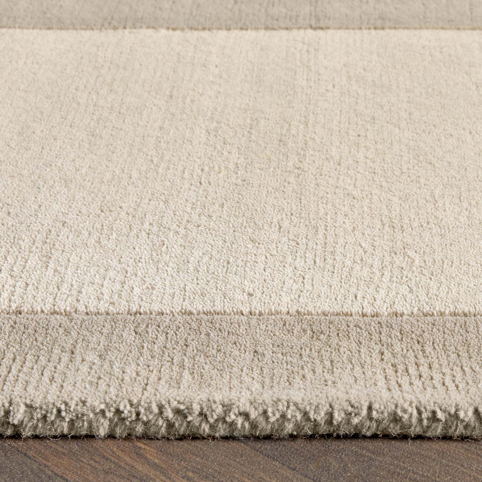 Border Nautral Runner - a 100% wool runner featuring a darker natural border. 