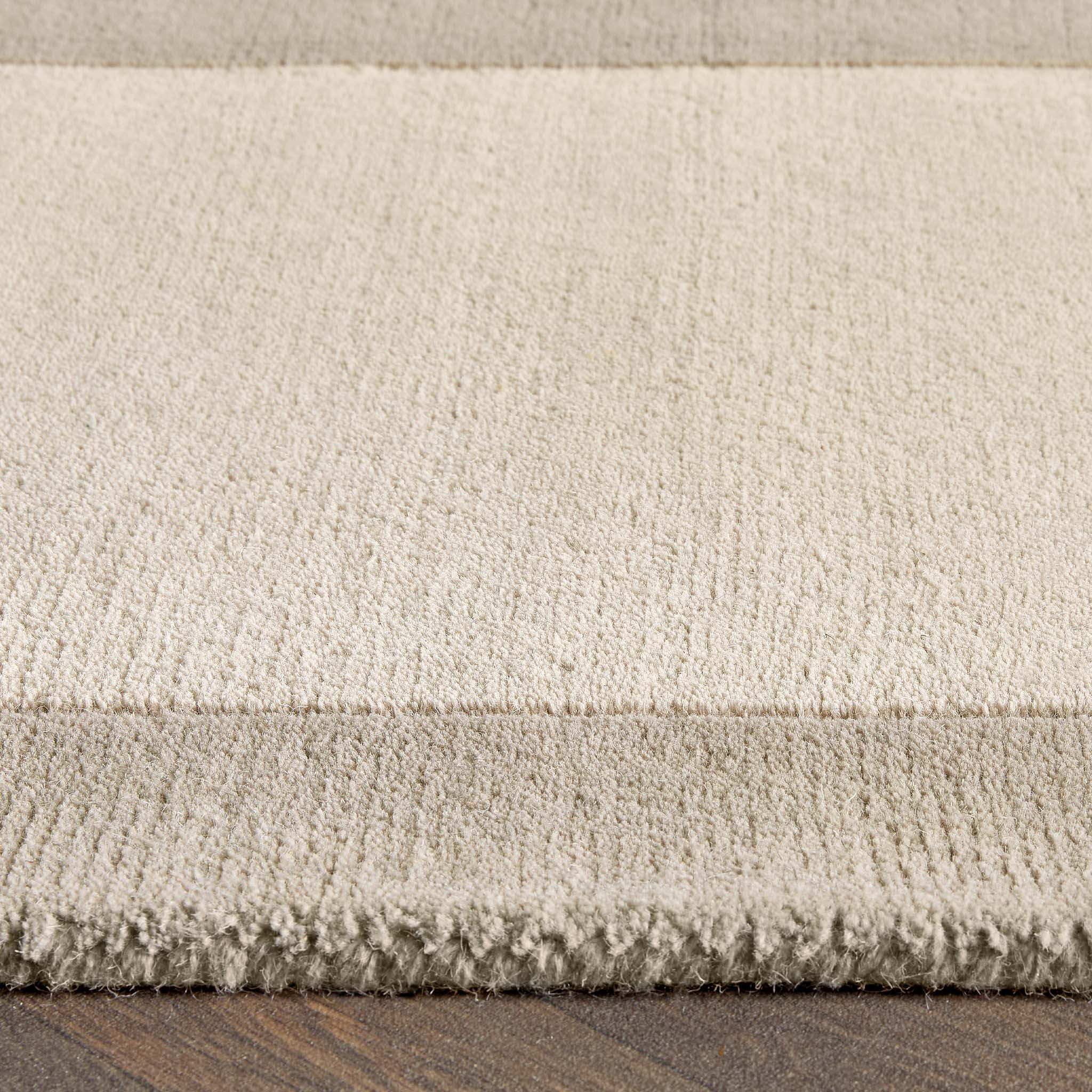 Border Nautral Runner - a 100% wool runner featuring a darker natural border. 