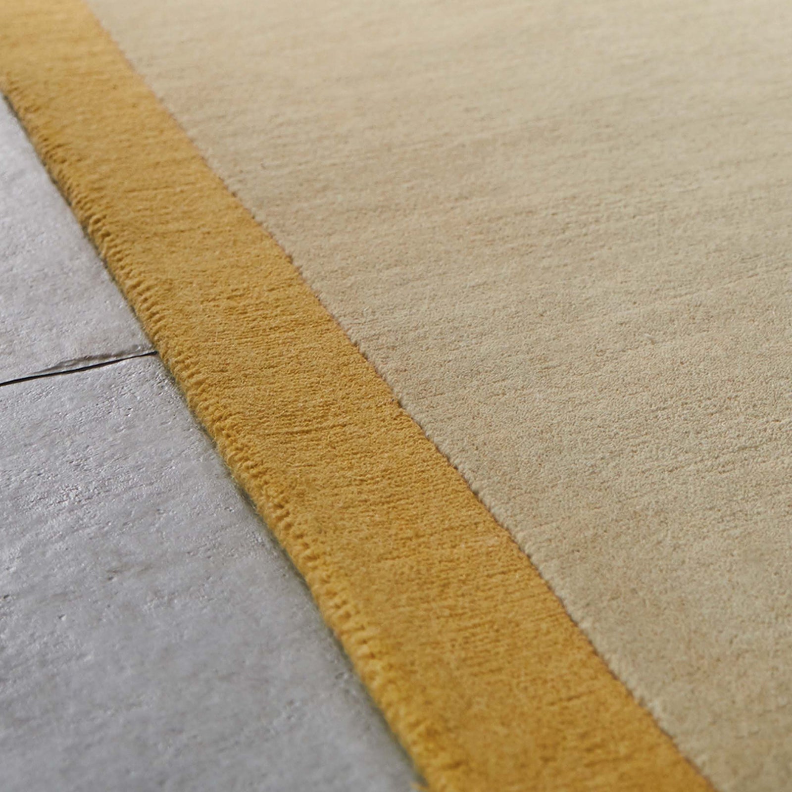 Borders Ochre Yellow 100% wool runner with a two-tone border design.