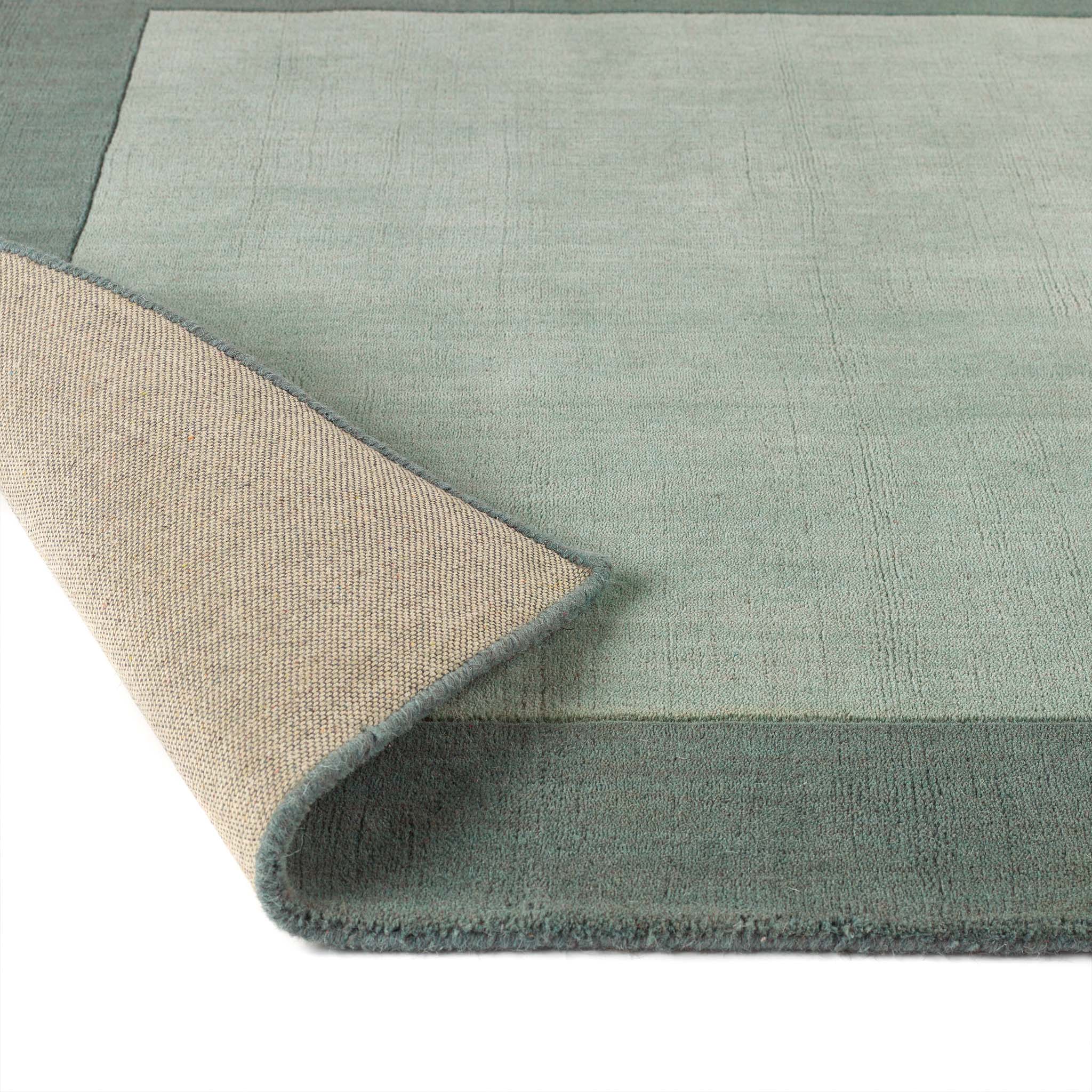 Borders Sage Green 100% wool runner with a two-tone border design.