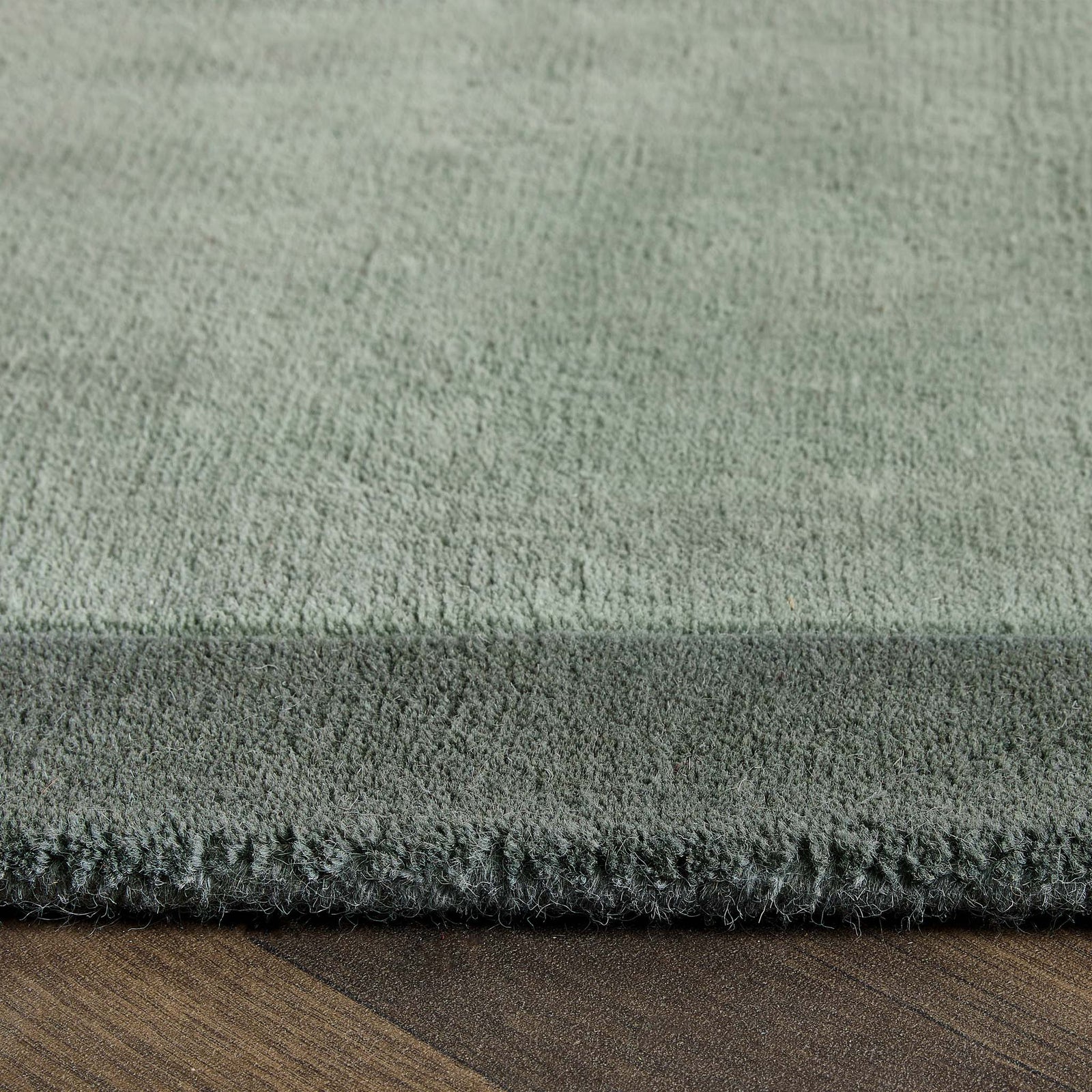 Borders Sage Green 100% wool runner with a two-tone border design.
