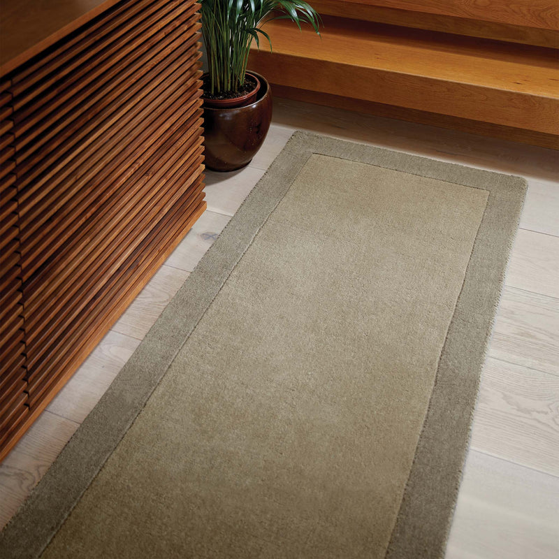 Borders Taupe Brown 100% wool runner with a two-tone border design, styled in a hallway.