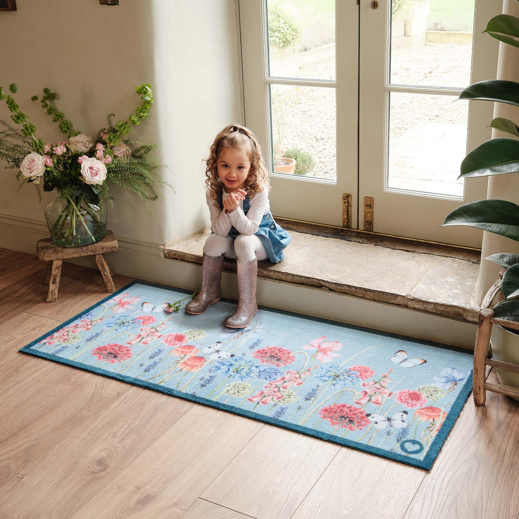 Butterfly Garden Blue Runner- 100% recycled cotton runner featuring a wildflower garden and butterflies. 