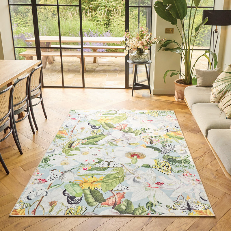 Butterfly Blooms Eco Washable Rug made from 100% recycled materials, featuring butterflies and oversized blooms.