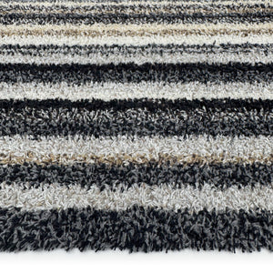 Candy Monochrome doormat- a cotton doormat featuring a striped design  in beige, grey, brown, black, and white.