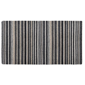 Candy Monochrome Washable Runner- a 100% recycled material runner featuring a subtle striped pattern in beige, grey, brown, black, and white. 