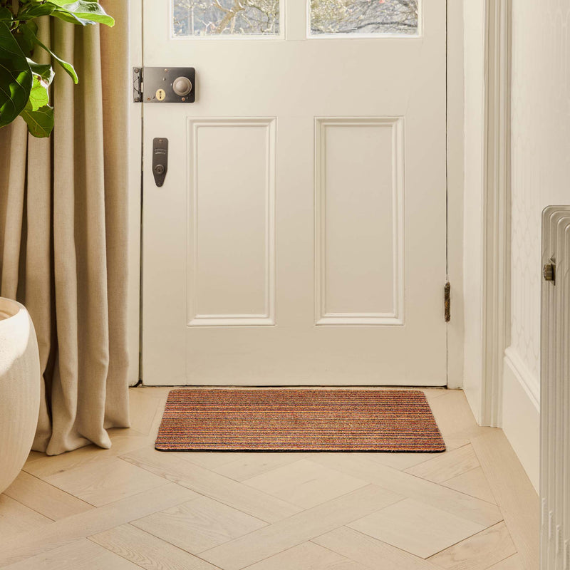 Candy Spring Stripe Multi Cotton Doormat  with a striped design. 