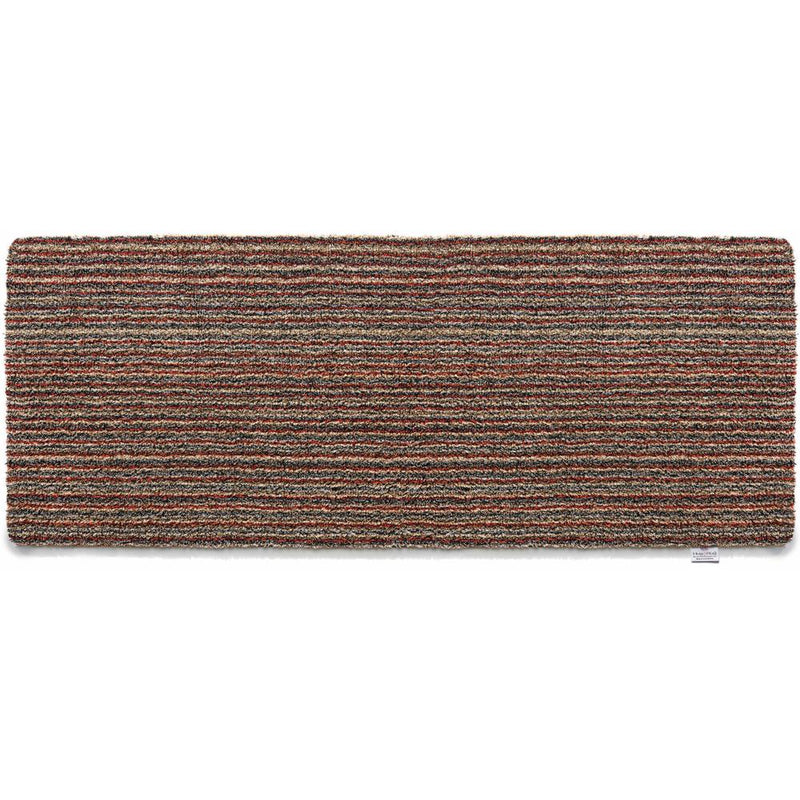 Candy Stripe Washable Runner- a 100% recycled material runner featuring a subtle striped pattern in shades of orange, red, beige, and grey.