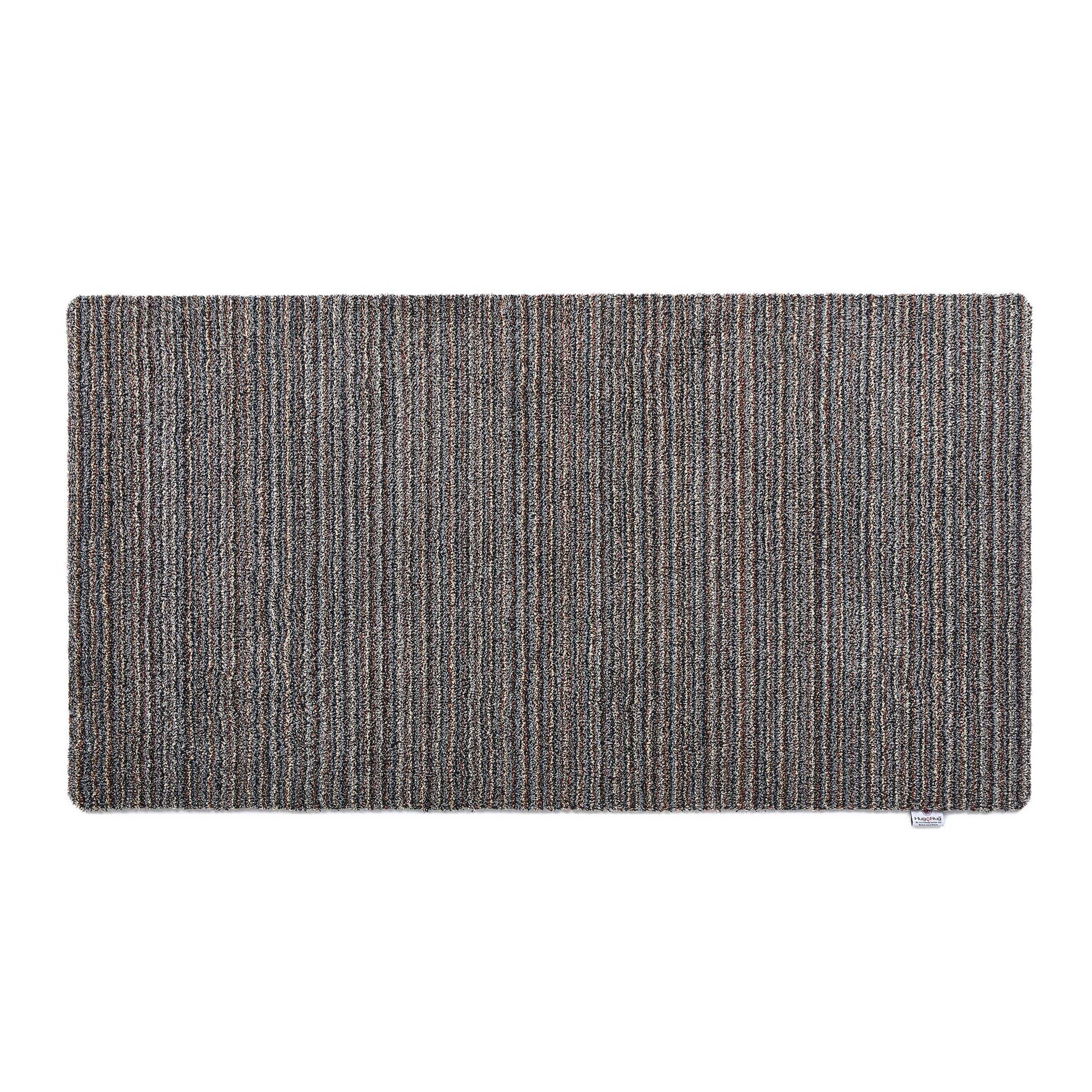 Candy Rocks Striped Washable Runner- a 100% recycled material runner featuring a subtle striped pattern in shades of beige, grey, and orange. 