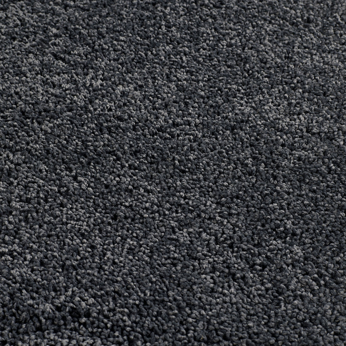 Charcoal Washable Rug in a solid dark grey colour, fully machine washable.
