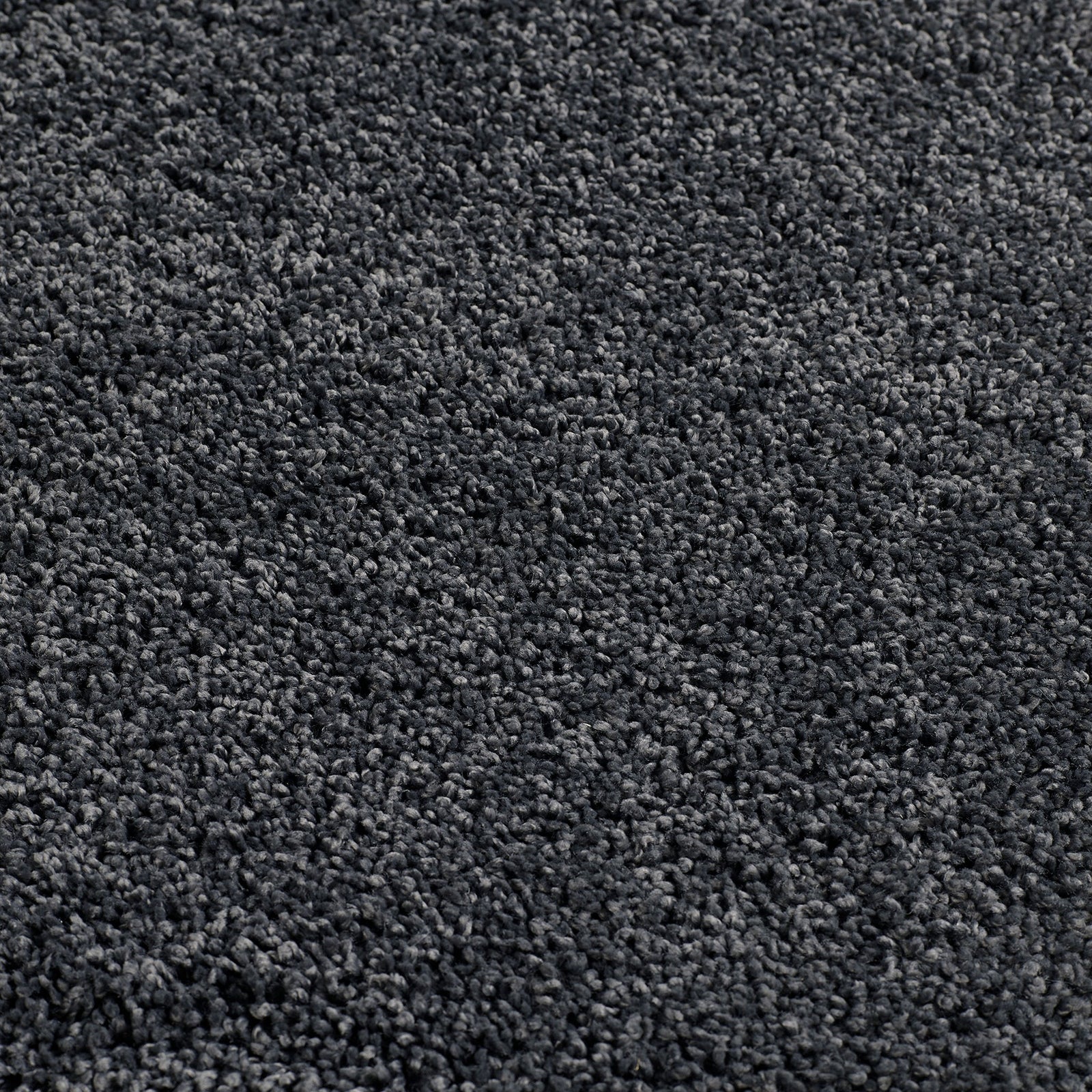 Charcoal Washable Rug in a solid dark grey colour, fully machine washable.