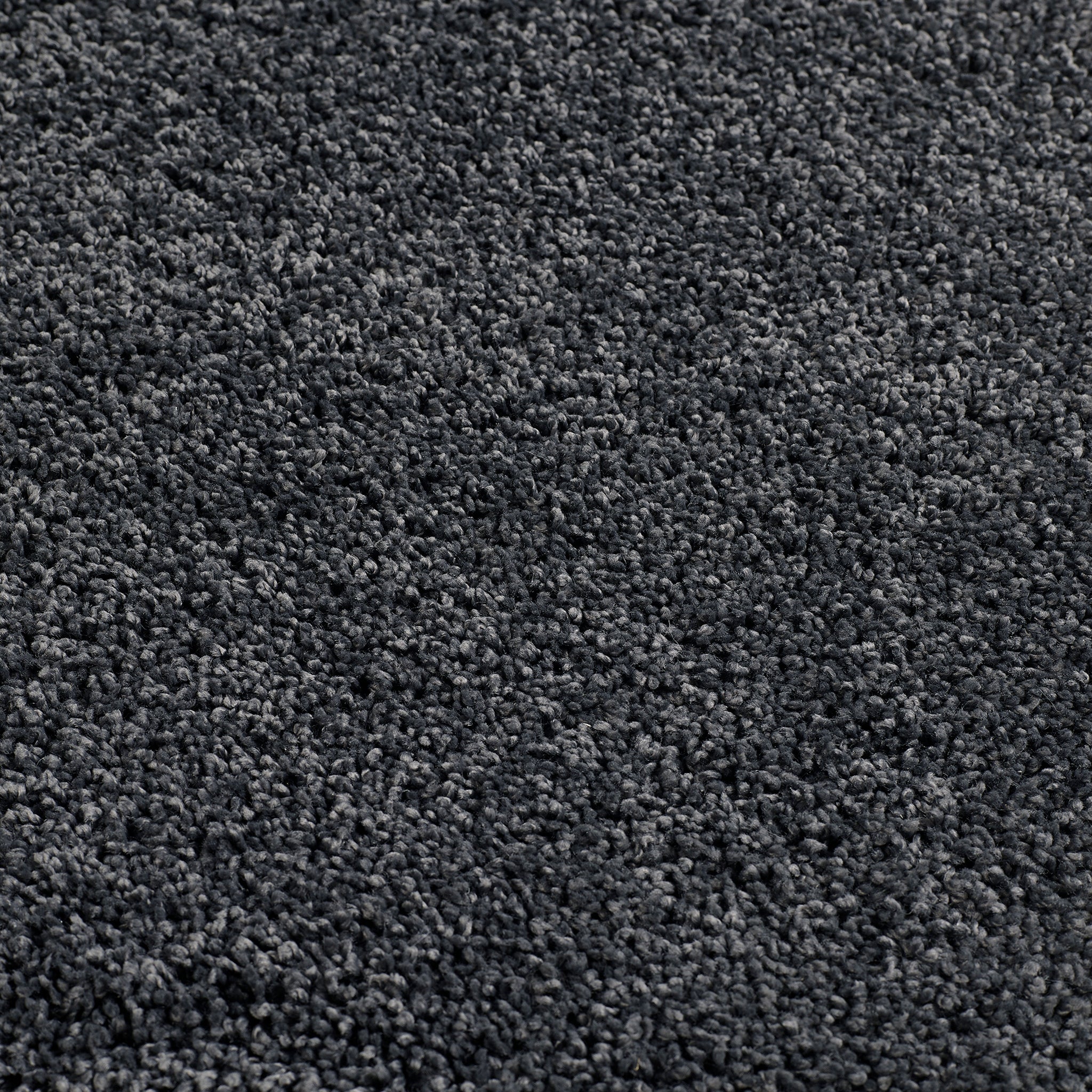 Charcoal Washable Rug in a solid dark grey colour, fully machine washable.