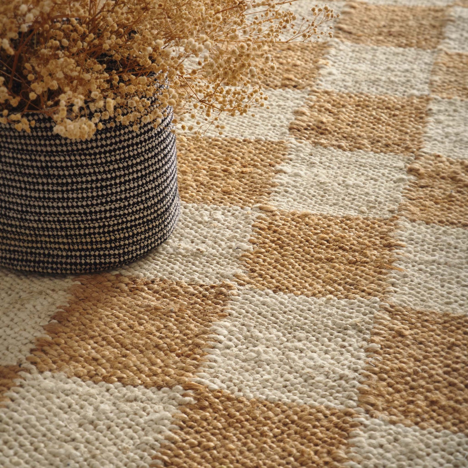 Close-up of Checkerboard Jute Natural Runner with a natural and brown checkerboard pattern.