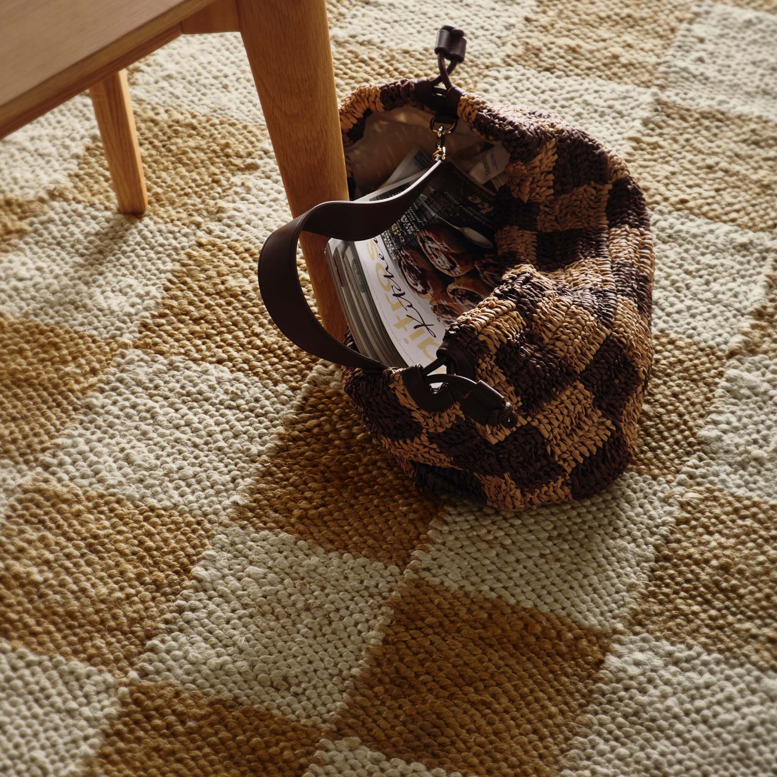 Close-up of Checkerboard Jute Natural Rug with natural and brown checkerboard pattern.