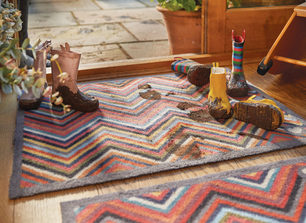 Chevron zig zag washable mat in doorway
