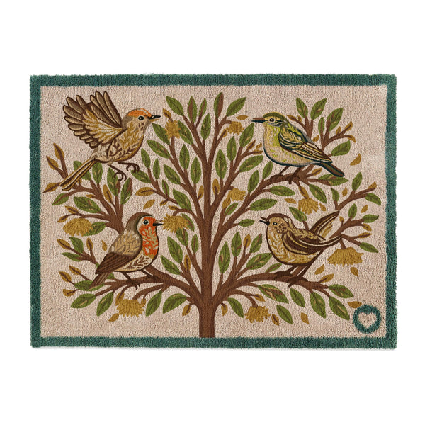 Chorus Bird Washable Doormat- a cotton doormat featuring multicoloured birds perched on a tree surround by orange and green leaves.