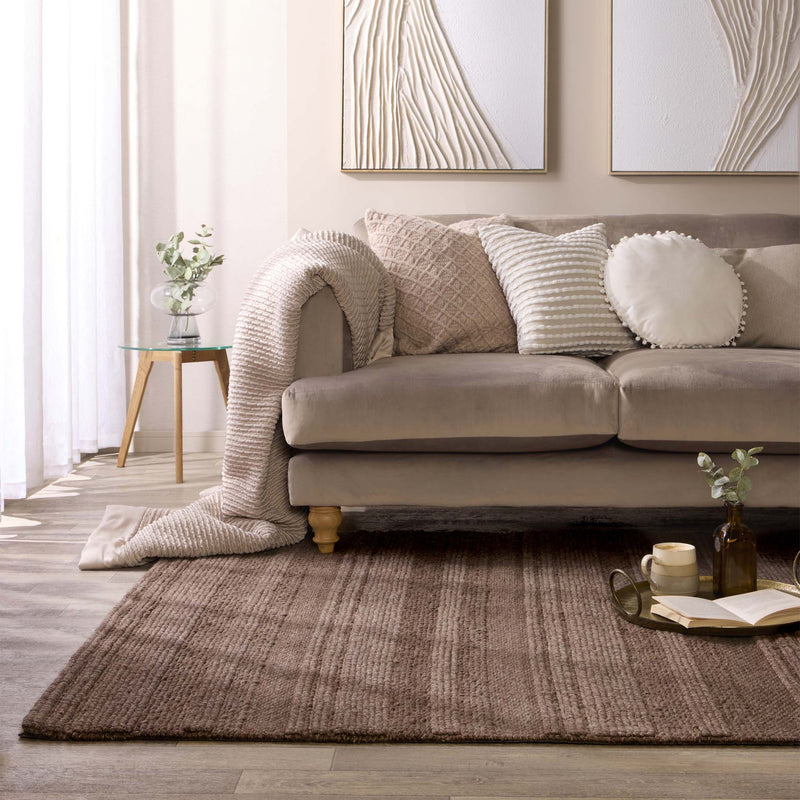 Chunky Knit Rug Brown- 100% wool rug featuring a knitted pattern in brown.