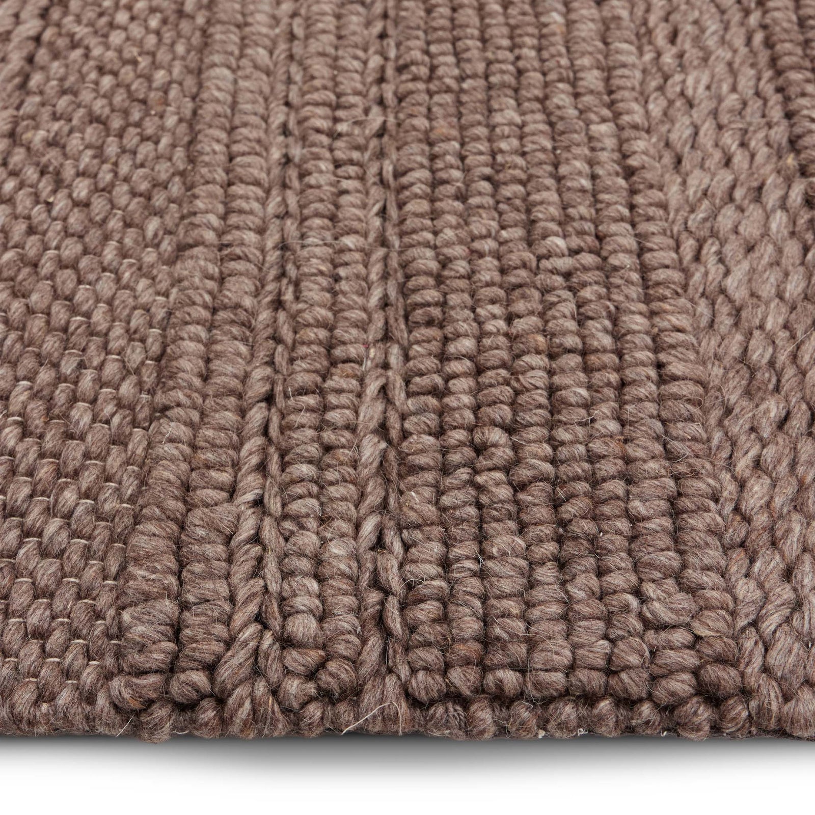 Chunky Knit Brown Runner. Made from 100% wiil featuring a textured pattern.