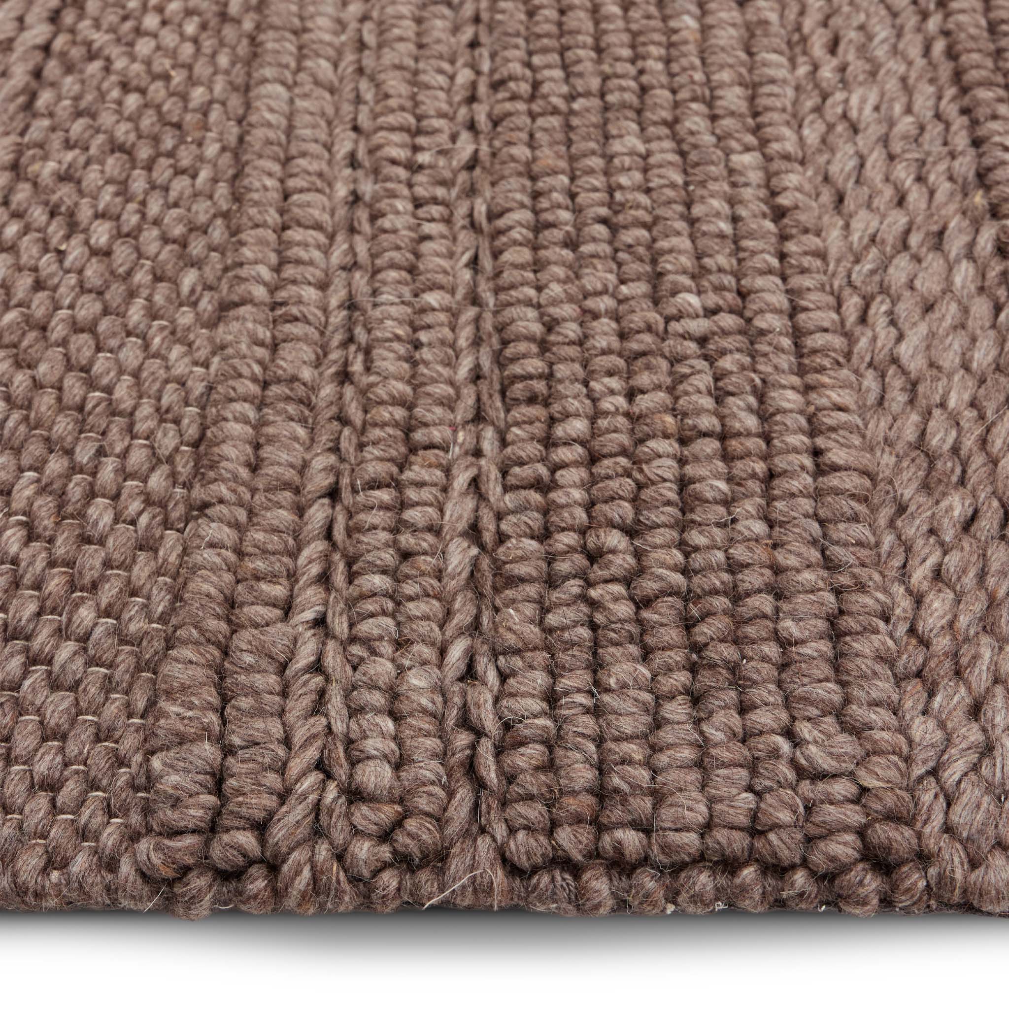 Chunky Knit Brown Runner. Made from 100% wiil featuring a textured pattern.