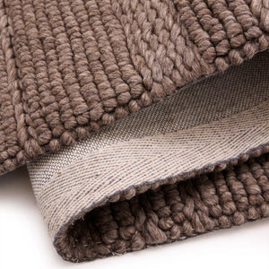 Chunky Knit Brown Runner. Made from 100% wiil featuring a textured pattern.