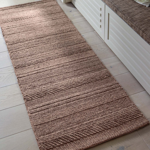 Chunky Knit Brown Runner. Made from 100% wiil featuring a textured pattern.