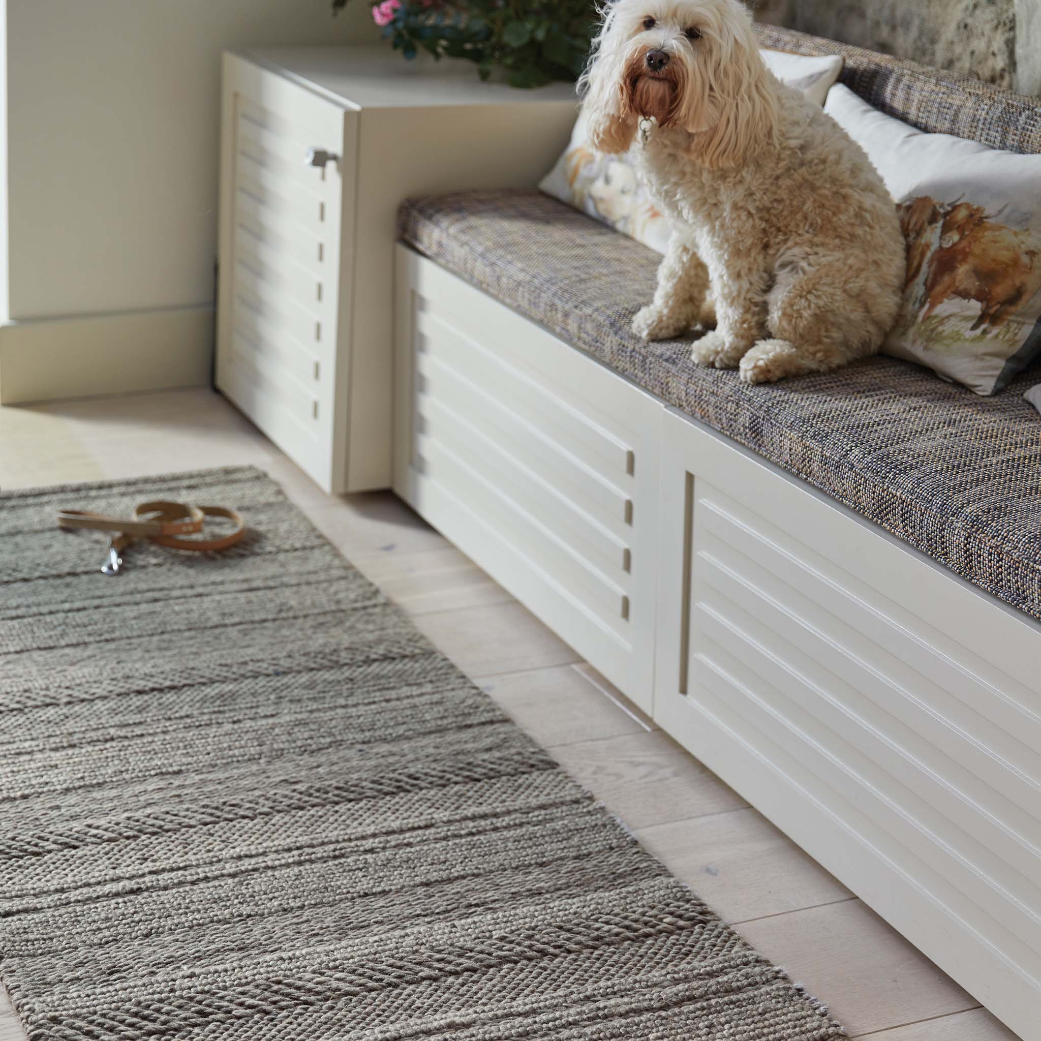 Chunky Knit Grey Wool Runner with a knitted pattern design, styled by a bench.