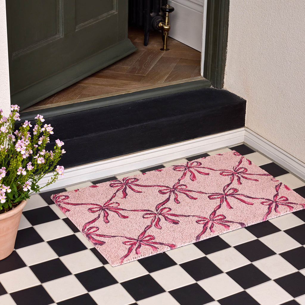 Blush Bows Coir Doormat- made from 100% coconut husk fibres with an eco-friendly backing.