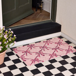 Blush Bows Coir Doormat- made from 100% coconut husk fibres with an eco-friendly backing.