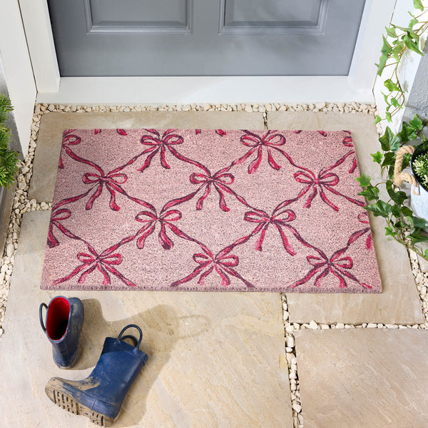 Blush Bows Coir Doormat- made from 100% coconut husk fibres with an eco-friendly backing.