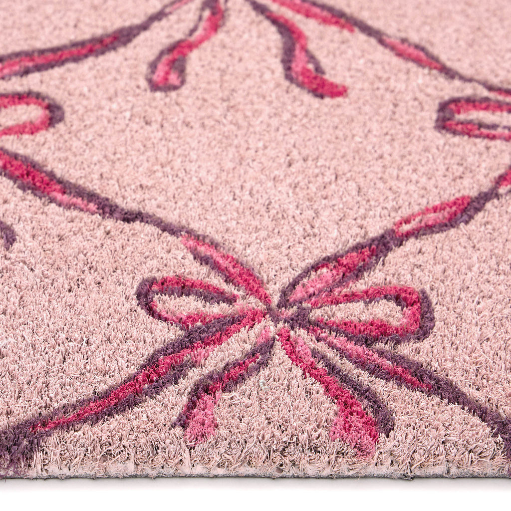 Blush Bows Coir Doormat- made from 100% coconut husk fibres with an eco-friendly backing.