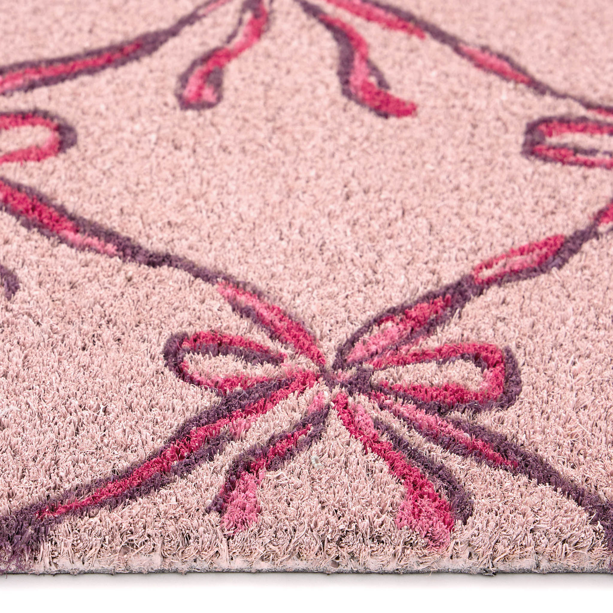 Blush Bows Coir Doormat- made from 100% coconut husk fibres with an eco-friendly backing.