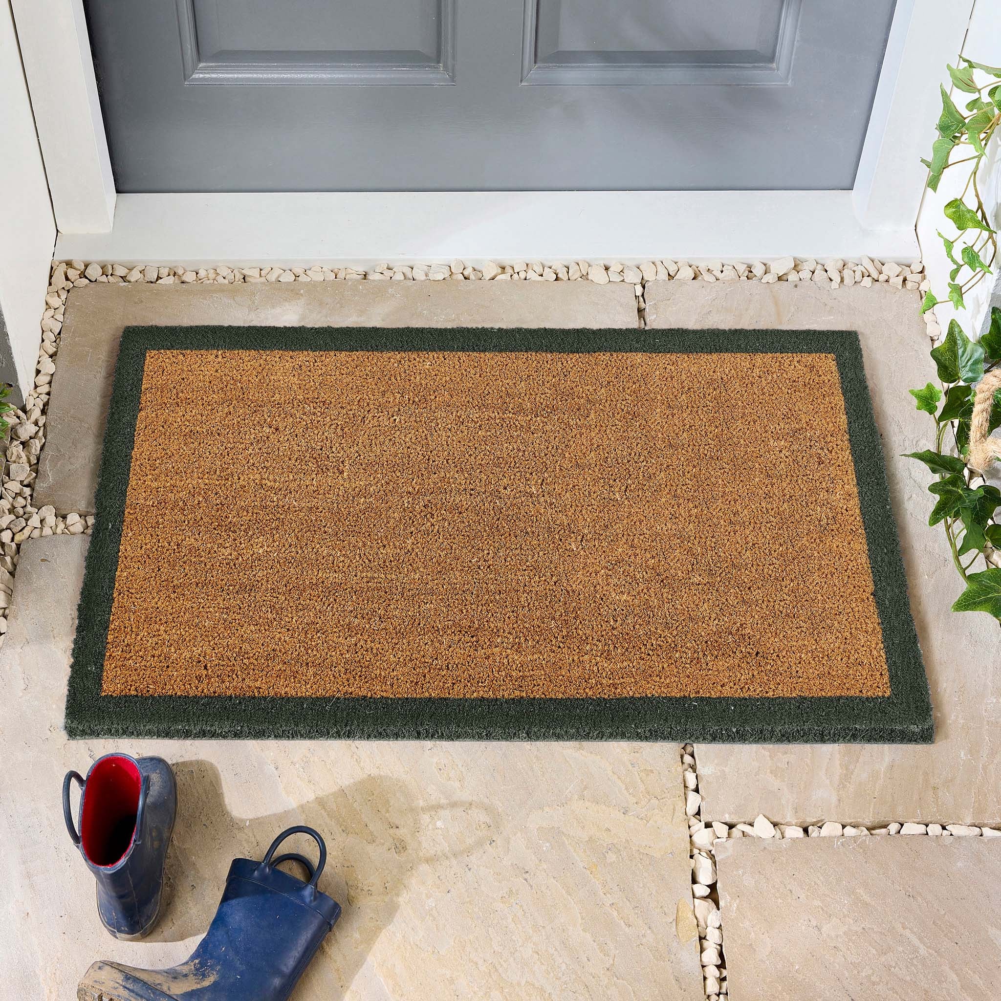 Printed Coir Border Green Doormat- made from recycled materials featuring a green border.