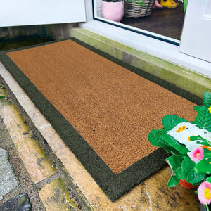 Printed Coir Border Green Runner- made from recycled materials featuring a green border.