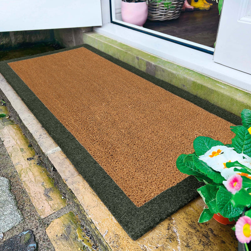 Printed Coir Border Green Runner- made from recycled materials featuring a green border.