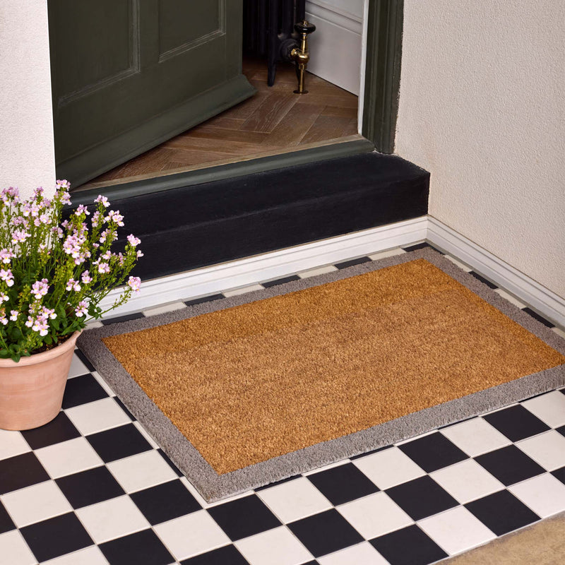 Taupe Border Coir Doormat- made from 100% coconut husk fibres with an eco-friendly backing.