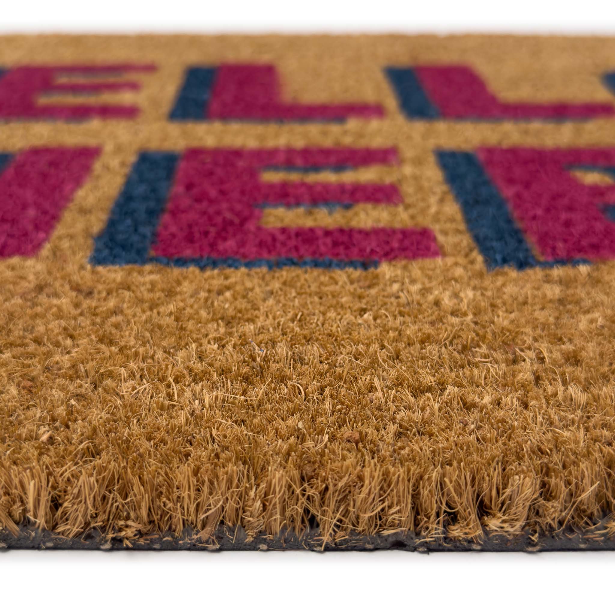 Hello There Coir Doormat - a 100% recycled material coir doormat featuring 'hello there' written in pink and blue lettering.