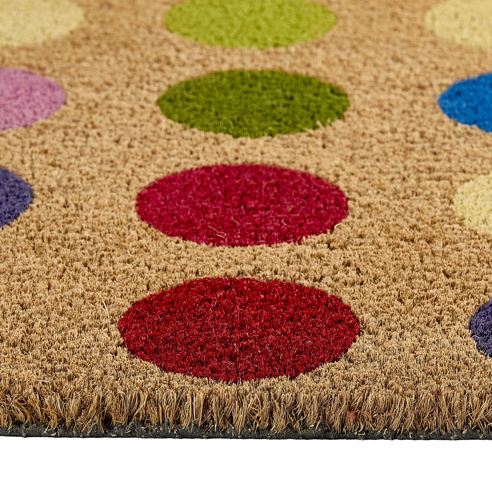 Spots Coir Doormat made from natural coconut husk fibres, featuring a multi coloured spot design.