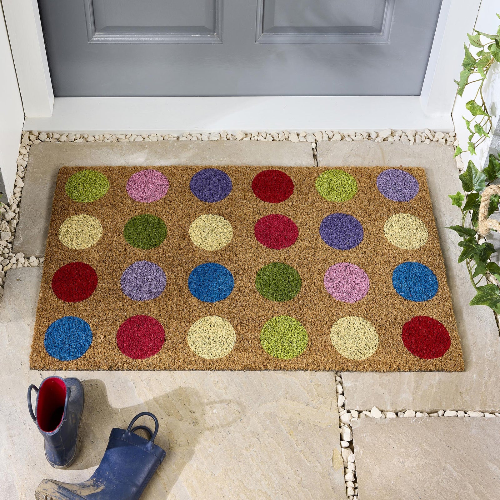 Spots Coir Doormat made from natural coconut husk fibres, featuring a multi coloured spot design.