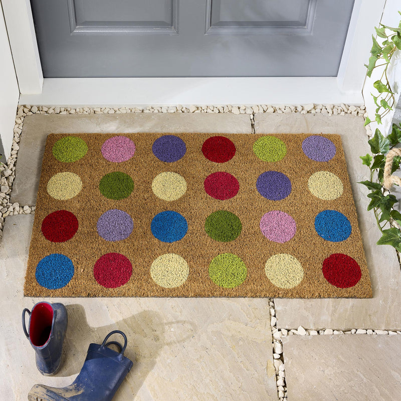 Spots Coir Doormat made from natural coconut husk fibres, featuring a multi coloured spot design.